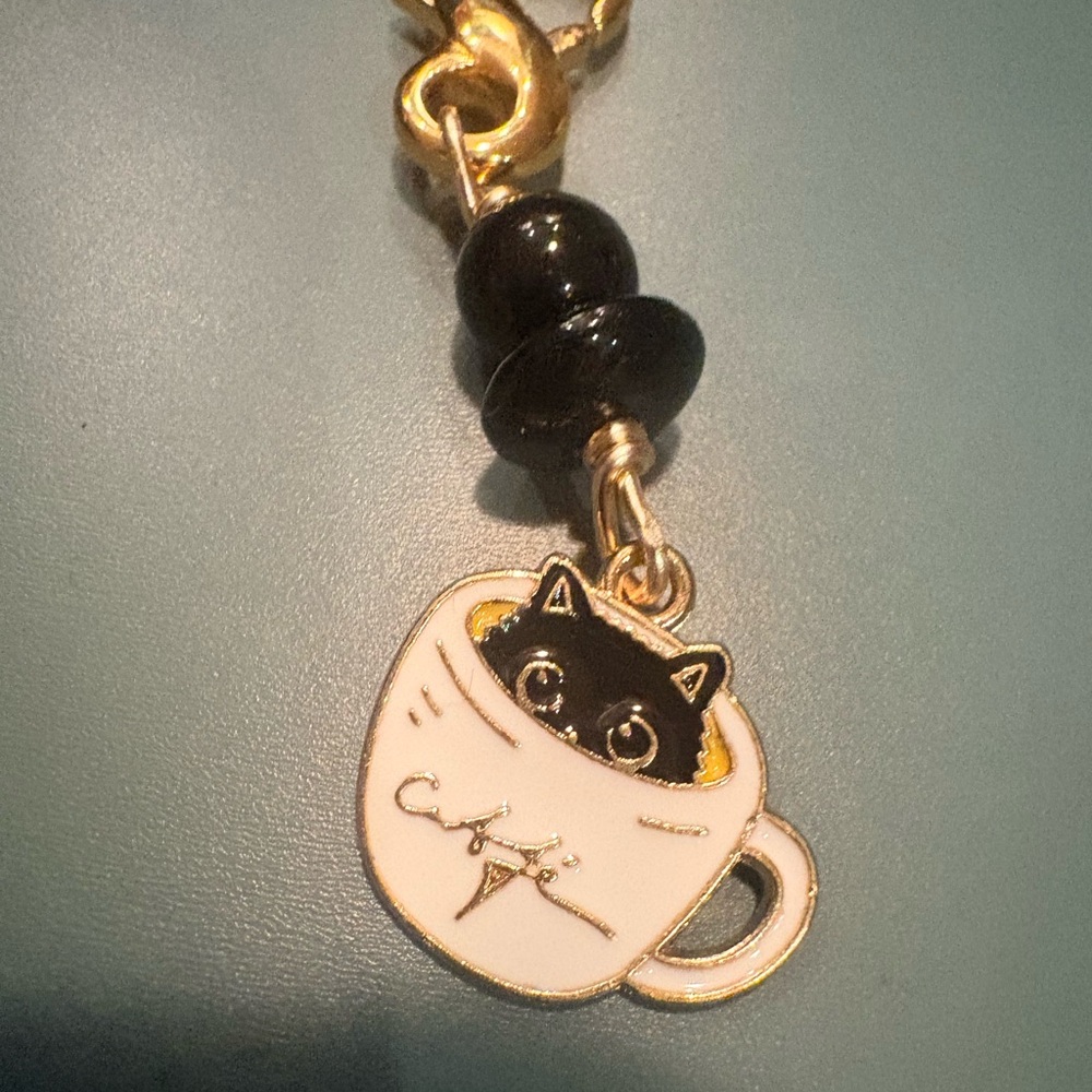 Boutique: Charming Cat Coffee Cup Keychain zipper pull- Black and Gold